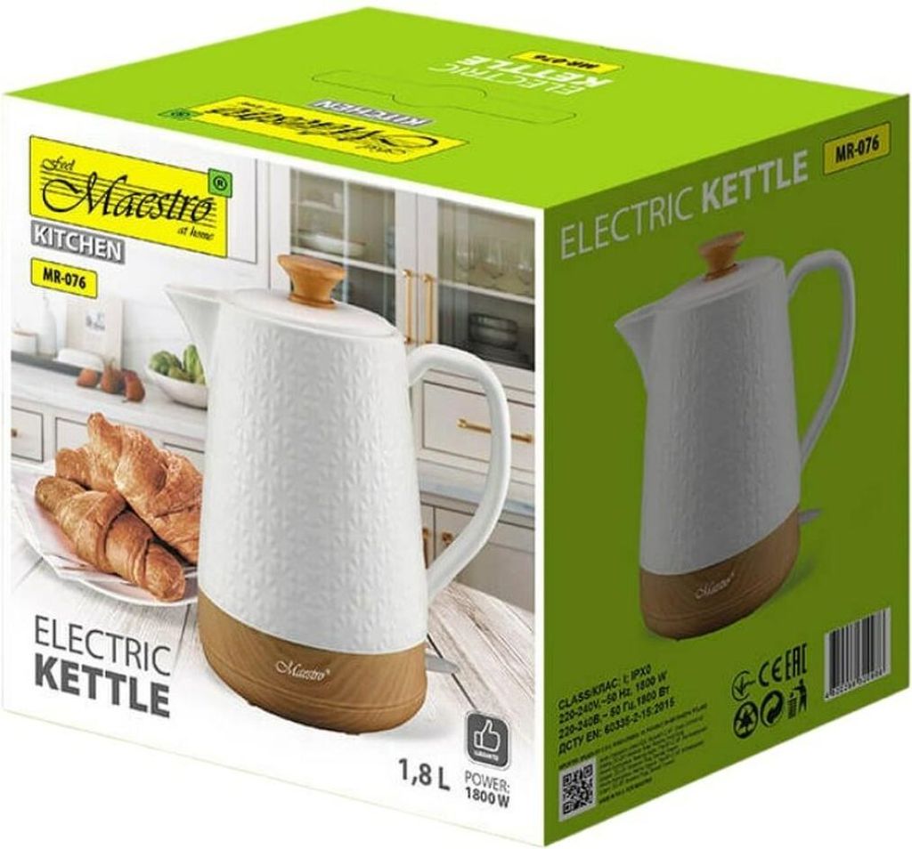 The image shows the packaging of a Maestro electric kettle, with a picture of the kettle and croissants on the front.