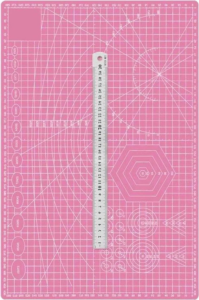 Tapis de découpe auto-cicatrisant rose : protégez vos tables des cutters
