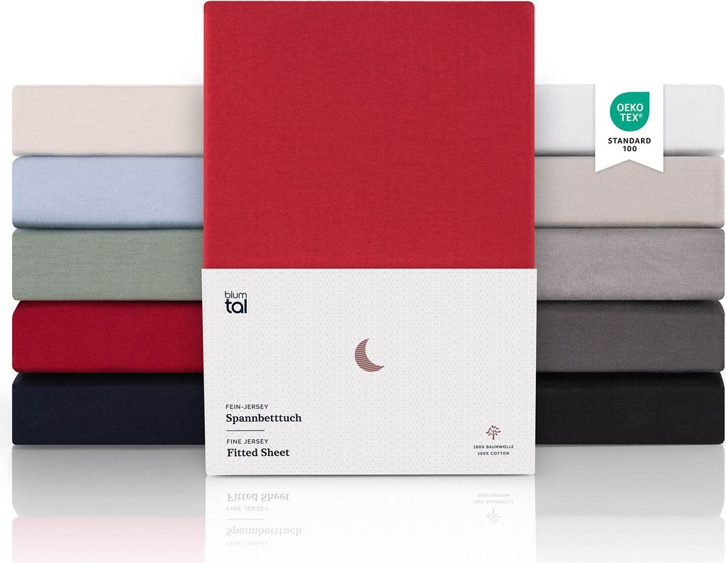 A product display of multiple fitted sheets in various colors, with one red sheet prominently featured in the center.