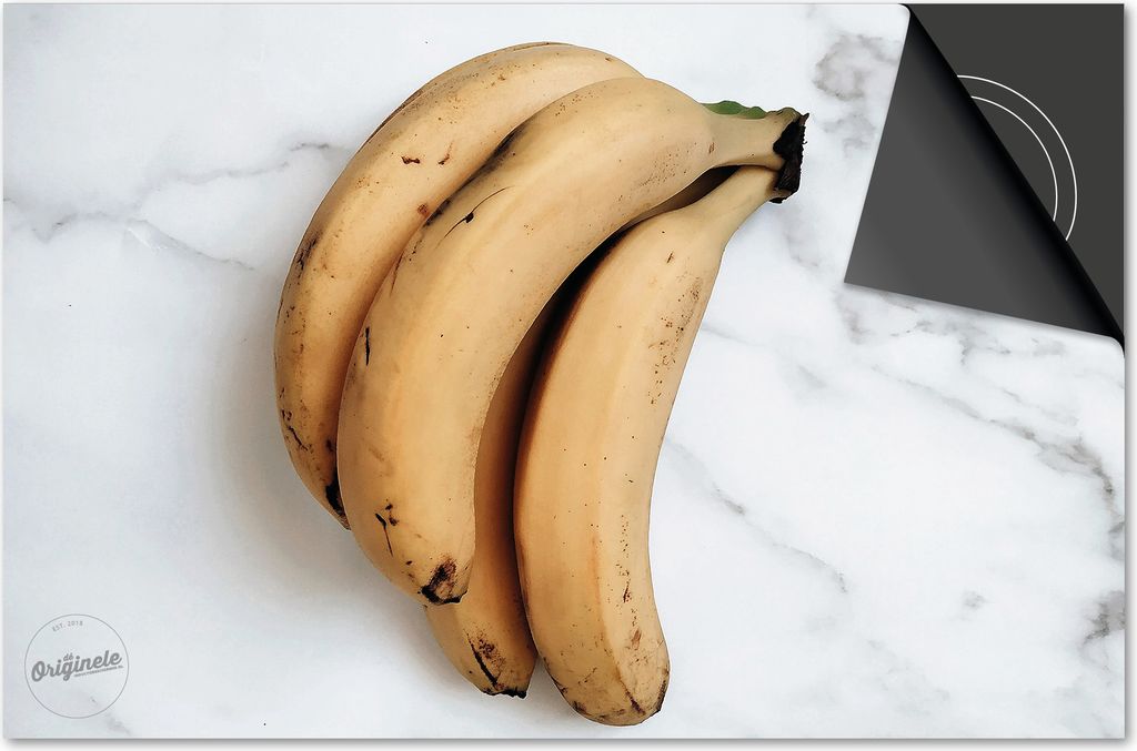 Induktionsschutz 65x52 - abdeckplatte Induktion matt- Dietrix Kochfeldschutz- DELUXE - Obst und Gemüse - Bananen tros auf Marmor Weiß