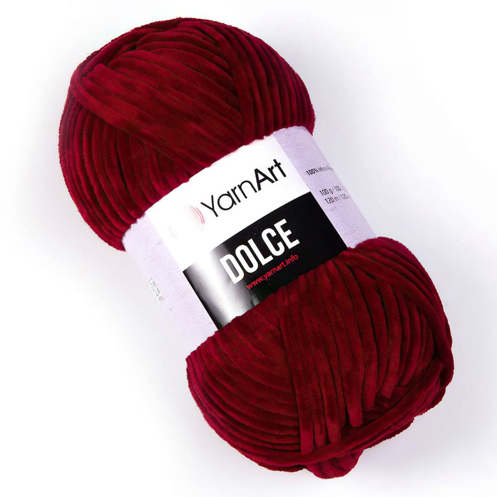 A ball of red yarn with a label.