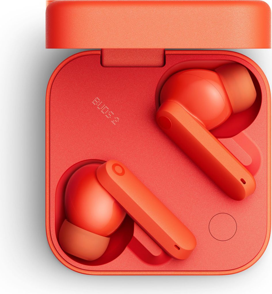An open orange charging case with two orange earbuds inside.