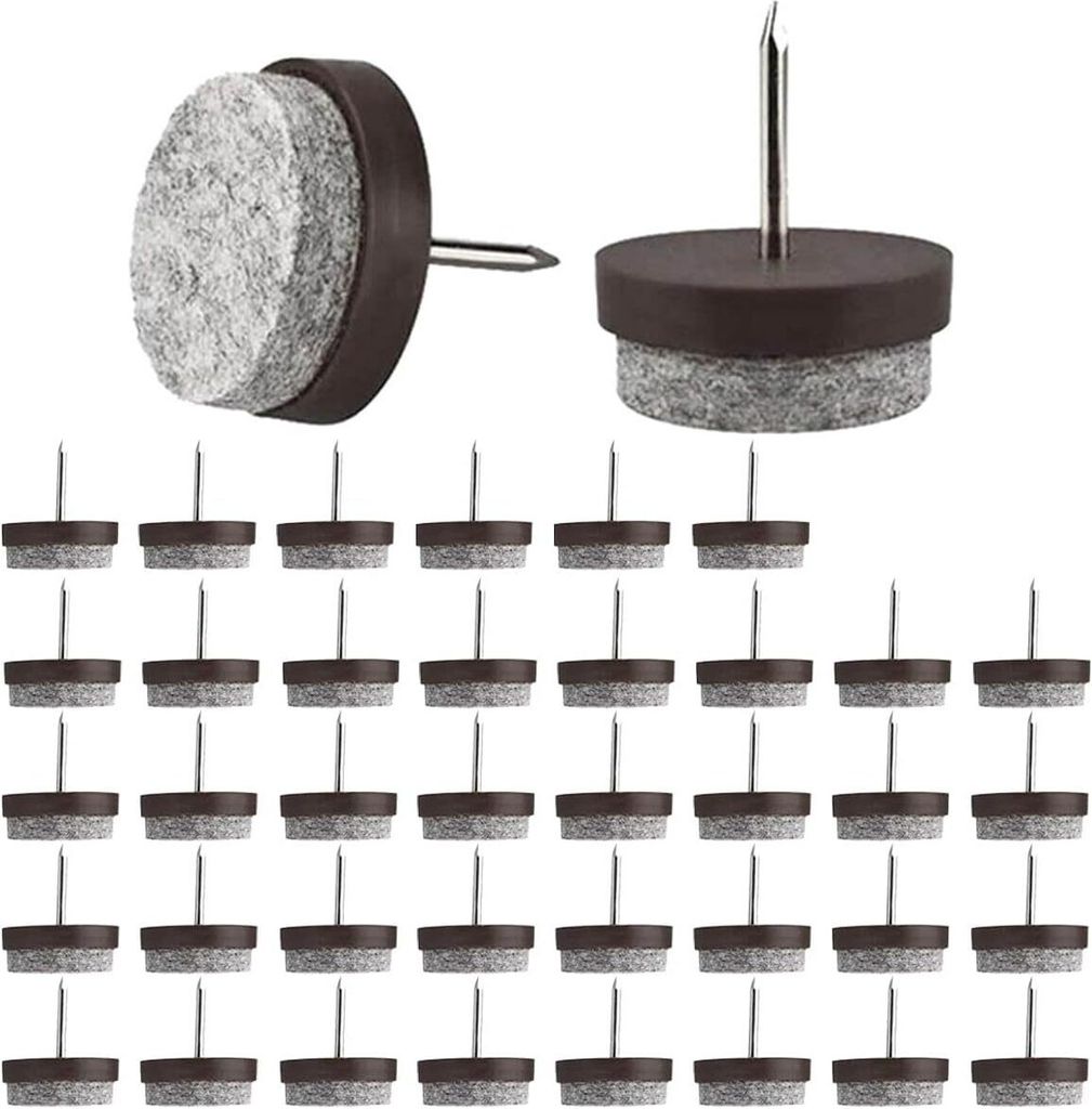 A collection of nail-in felt furniture glides with brown plastic bases and gray felt pads.