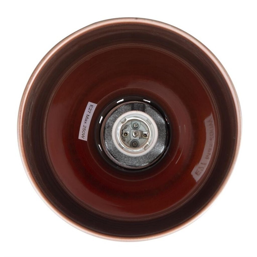 The inside of a copper-finished lamp shade, showing the bulb socket.