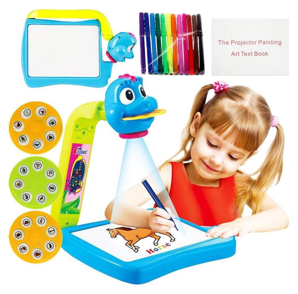 A young girl is using a drawing projector to trace a horse onto a piece of paper. The projector is a toy with a blue cartoon character head and a light beam. There are also marker pens and projection discs shown.