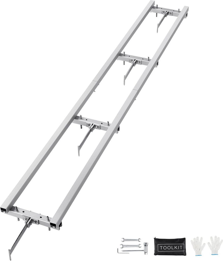A long, silver metal guide system for a portable sawmill, shown against a white background. Accessories like wrenches, a toolkit bag, and gloves are visible in the bottom right corner.