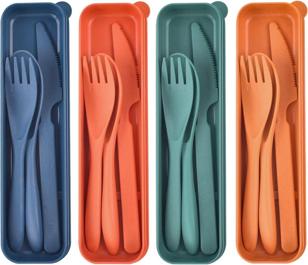 Four sets of reusable cutlery, each in its own colored case, arranged side-by-side.