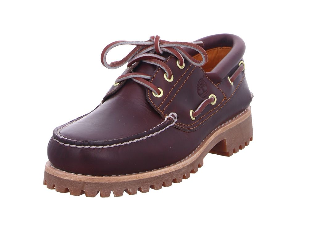 A single brown leather boat shoe with a thick lug sole is shown against a white background.