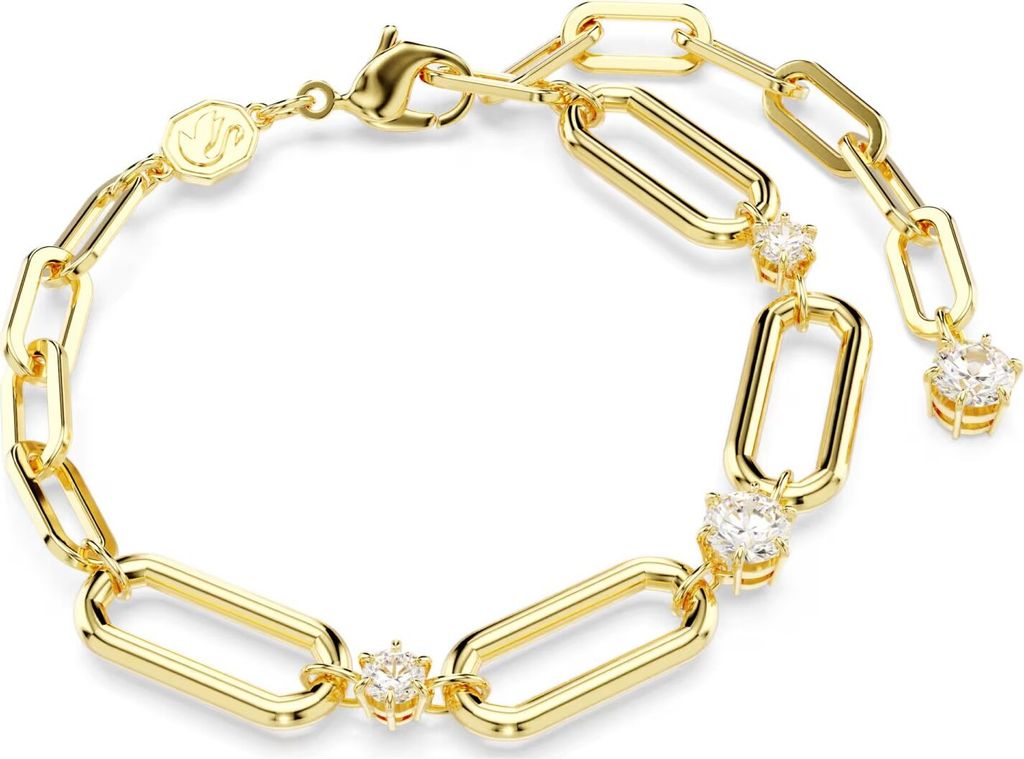 A close-up studio shot of a gold-colored bracelet with clear stones.