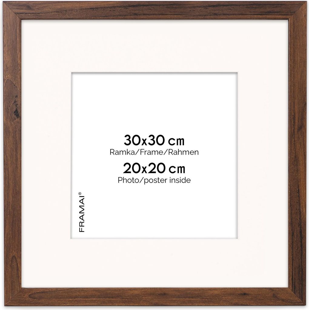 A square picture frame with a white mat and text indicating dimensions.
