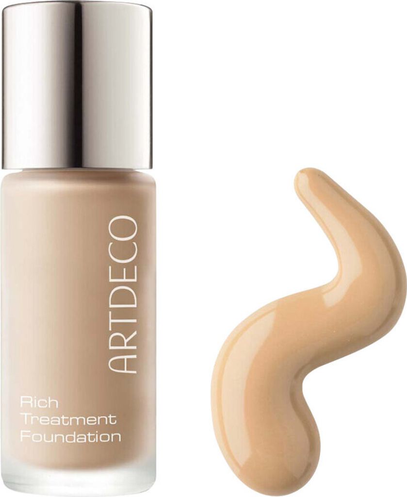 A bottle of foundation and a swatch of the product on a white background.
