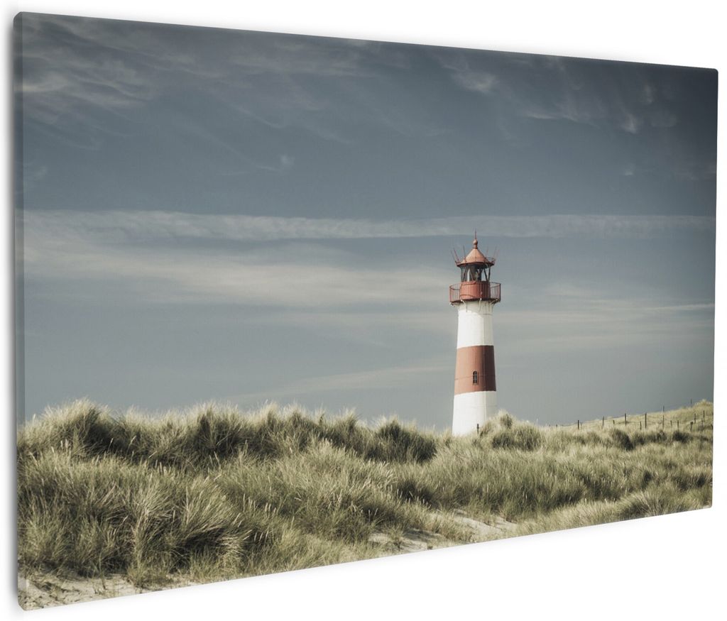 Wallario Premium Leinwandbild Leuchtturm auf der Düne am Strand in Größe 60 x 90 cm