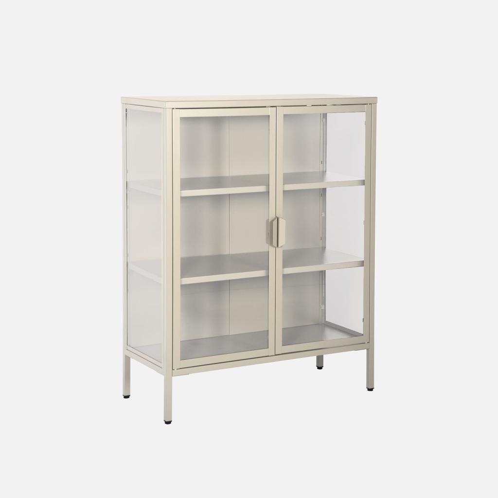 A beige metal cabinet with glass doors and shelves, shown against a white background.