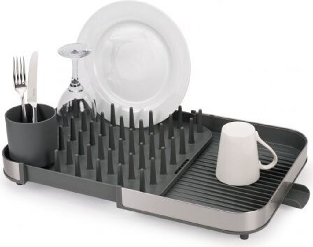 A dish rack with various kitchen utensils.