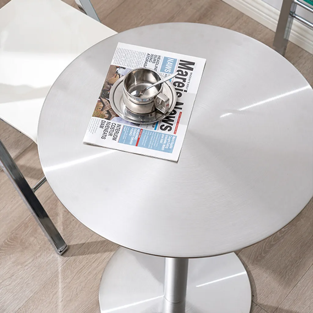 Table de restaurant ronde en inox stable et facile à nettoyer