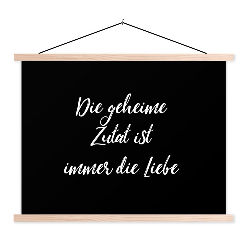 MuchoWow Textilposter Zitate - Die geheime Zutat ist immer die Liebe - Sprichwörter - Kochen 40x30 cm mit holzfarbenen Rahmen - Bilder