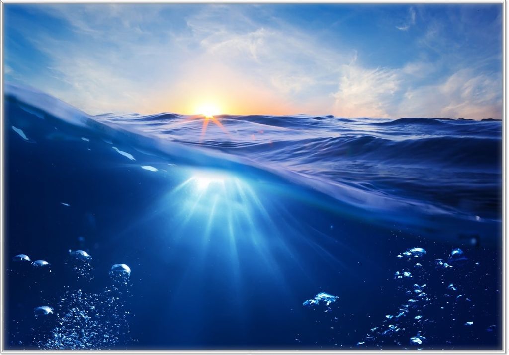 Wallario Wandbild Wellen im Meer bei Sonnenuntergang, Größe: 70,30 x 100,30 cm, Poster mit weißem Kunststoffrahmen