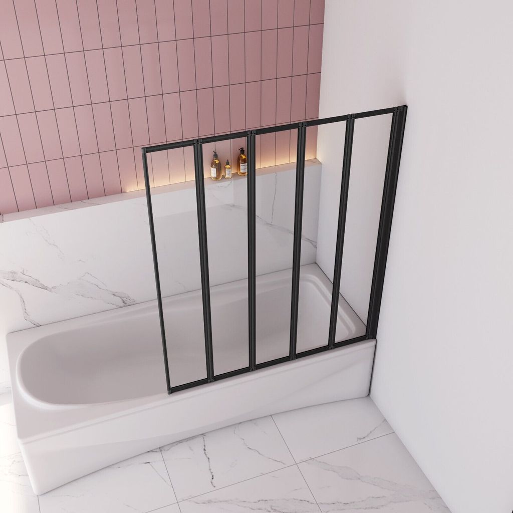 A bathtub with a folding shower screen in a modern bathroom.
