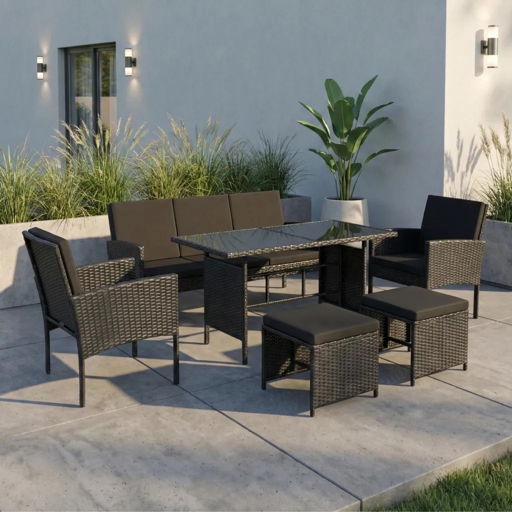Ensemble repas jardin 7 places avec table en verre trempé et poufs noirs