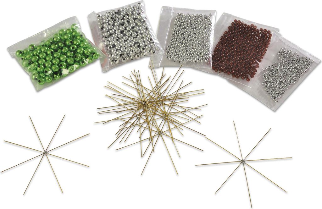 A collection of craft supplies including beads and wire star bases.