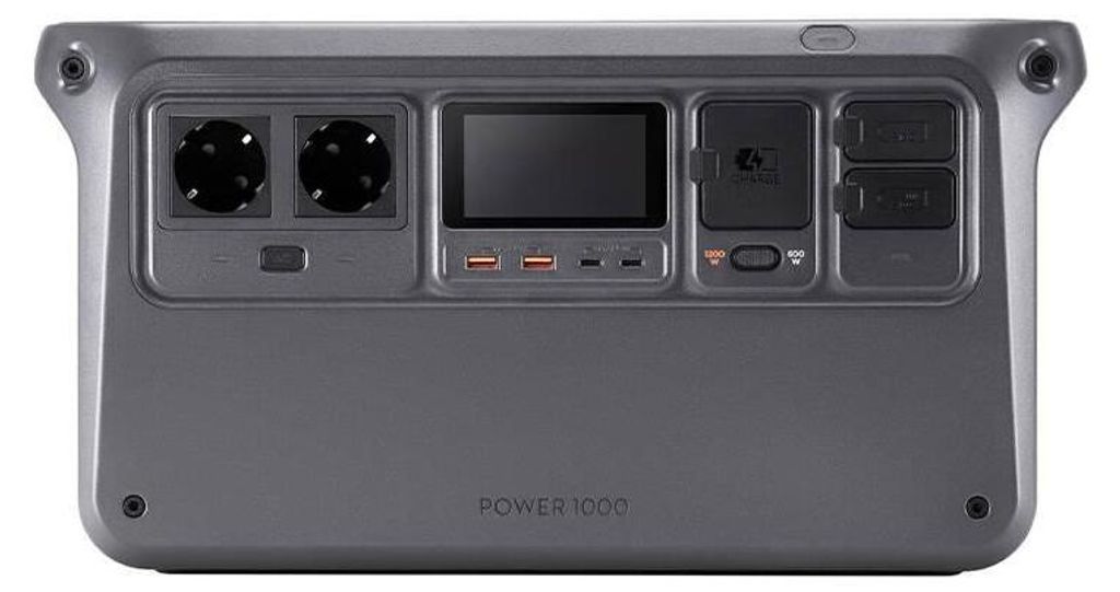 A close-up view of the ports and screen of a portable power station.