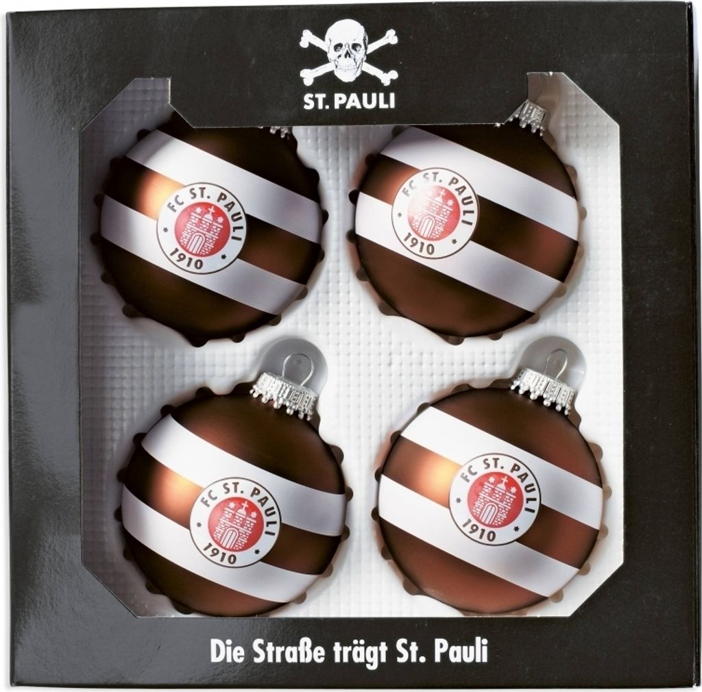 A box containing four FC St. Pauli themed Christmas ornaments.