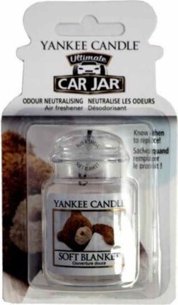 A Yankee Candle Car Jar air freshener in 'Soft Blanket' scent, presented in its retail packaging.