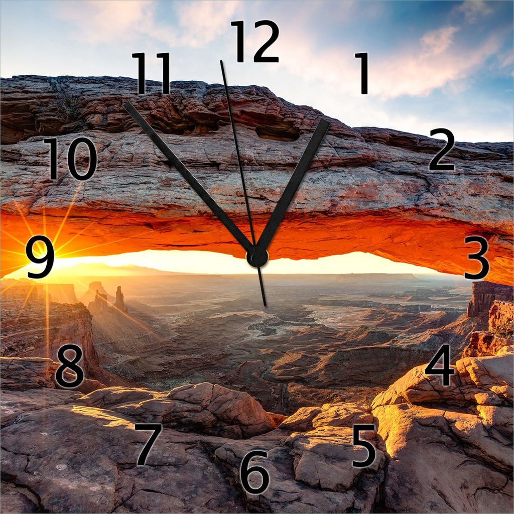 Wallario Design Wanduhr Sonnenstrahl am Horizont Leuchtende Felsspalte aus Echtglas, Größe 30 x 30 cm