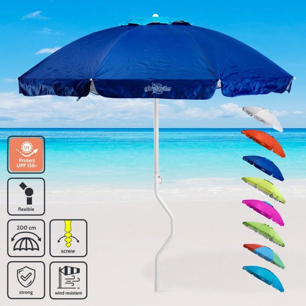 A blue beach umbrella is displayed on a sandy beach with the ocean and sky in the background. Several other colored umbrellas are shown to the right.