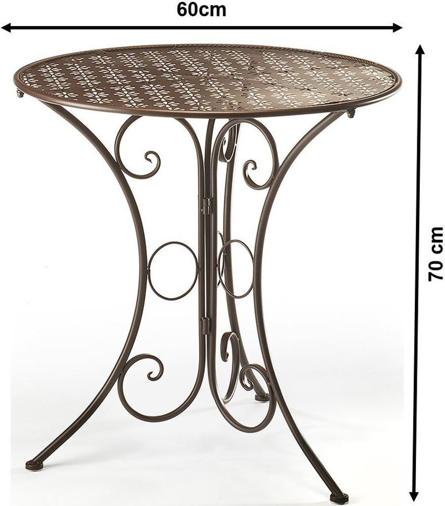 A decorative metal garden table with intricate cutouts.