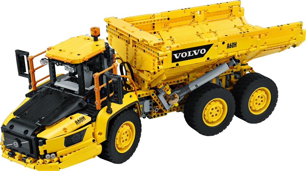 A yellow LEGO Technic Volvo articulated hauler is shown against a white background.