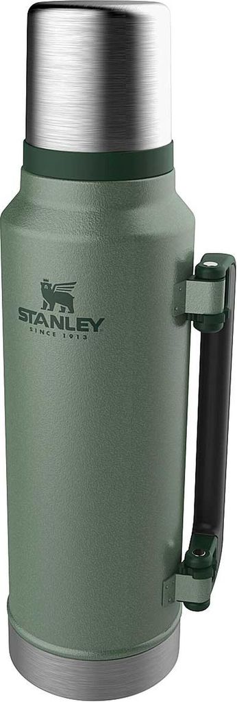 A green Stanley thermos bottle with a silver top and handle.