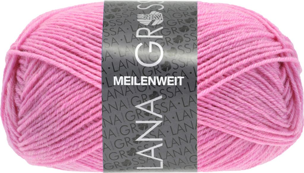 A ball of pink yarn with a label wrapped around it.