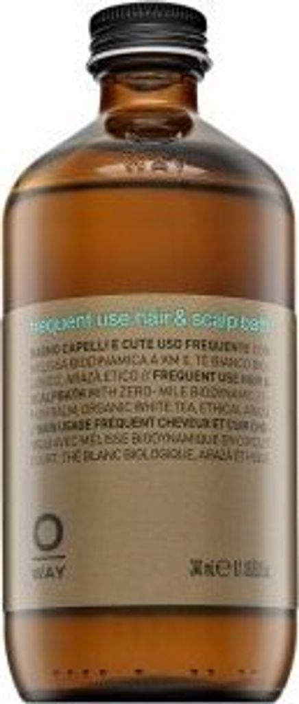A brown glass bottle of shampoo with a label.