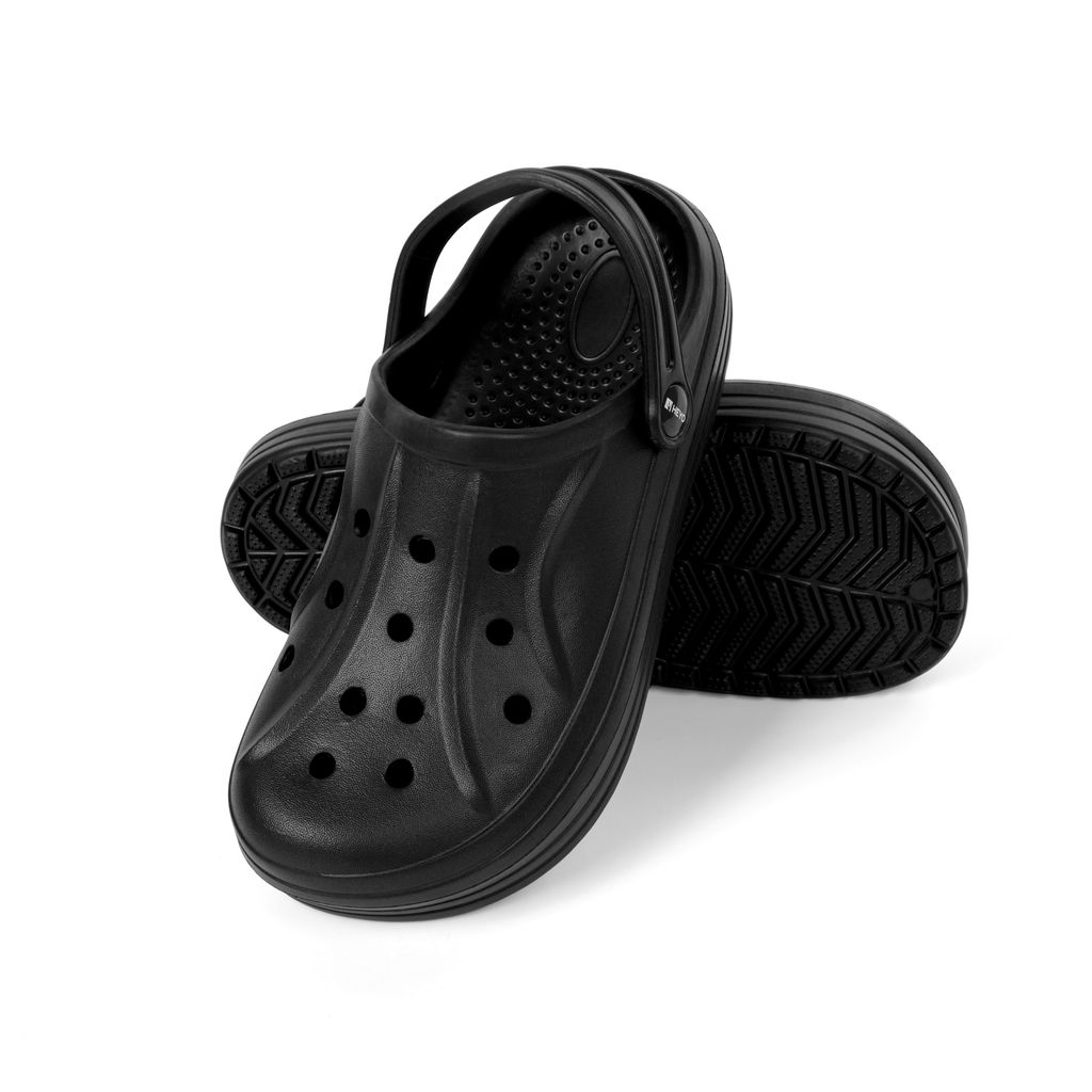 A pair of black clogs on a white background.