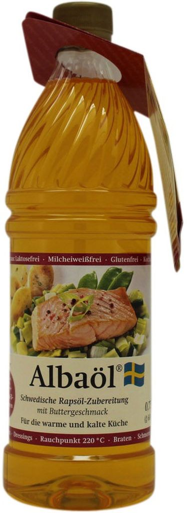 A bottle of cooking oil with a label showing a picture of salmon and vegetables.