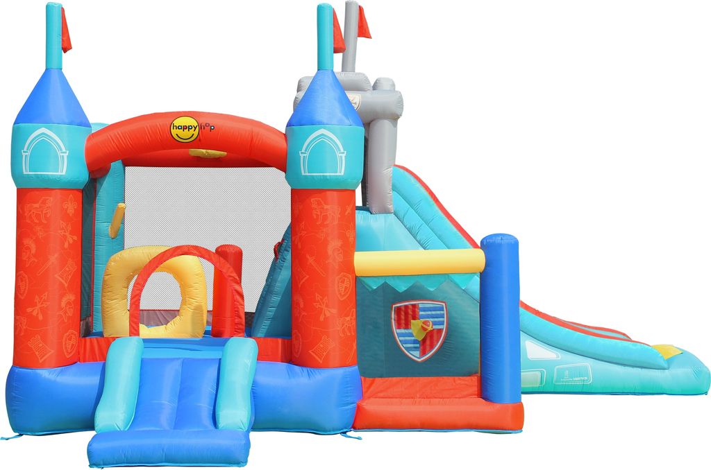 An inflatable castle-themed bounce house with a slide.
