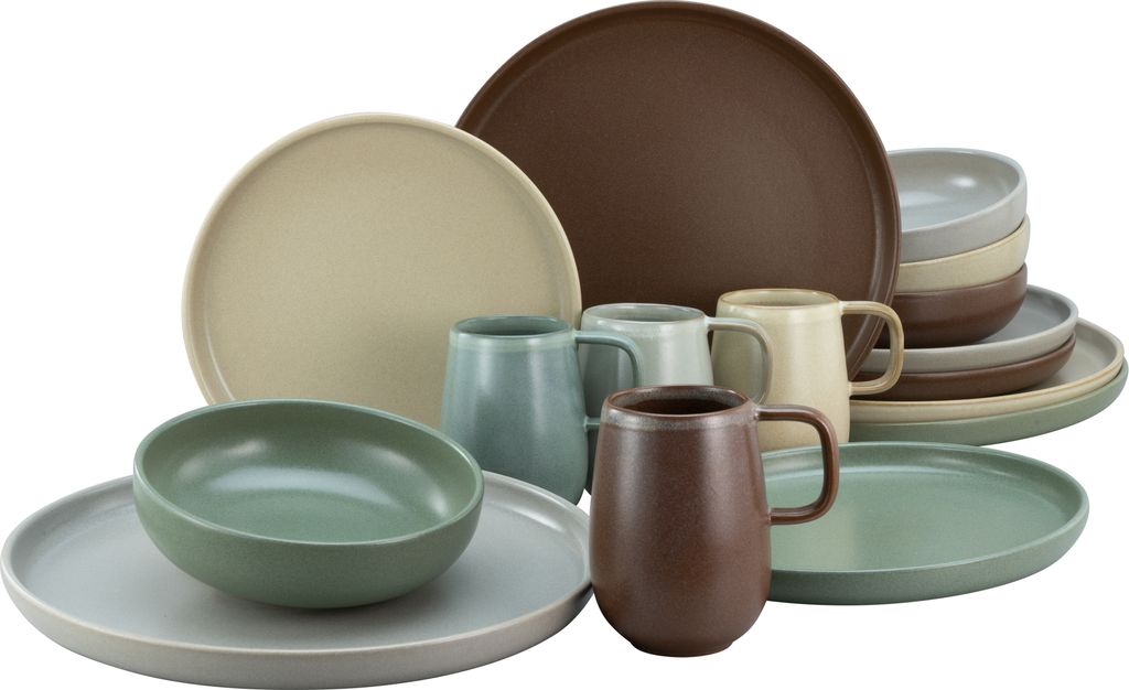 A collection of stoneware dishes and mugs in various earthy tones.