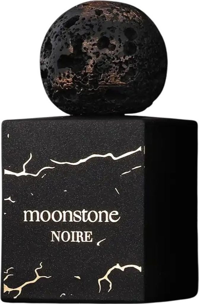 A black perfume bottle with a textured, spherical cap sits on a white background.