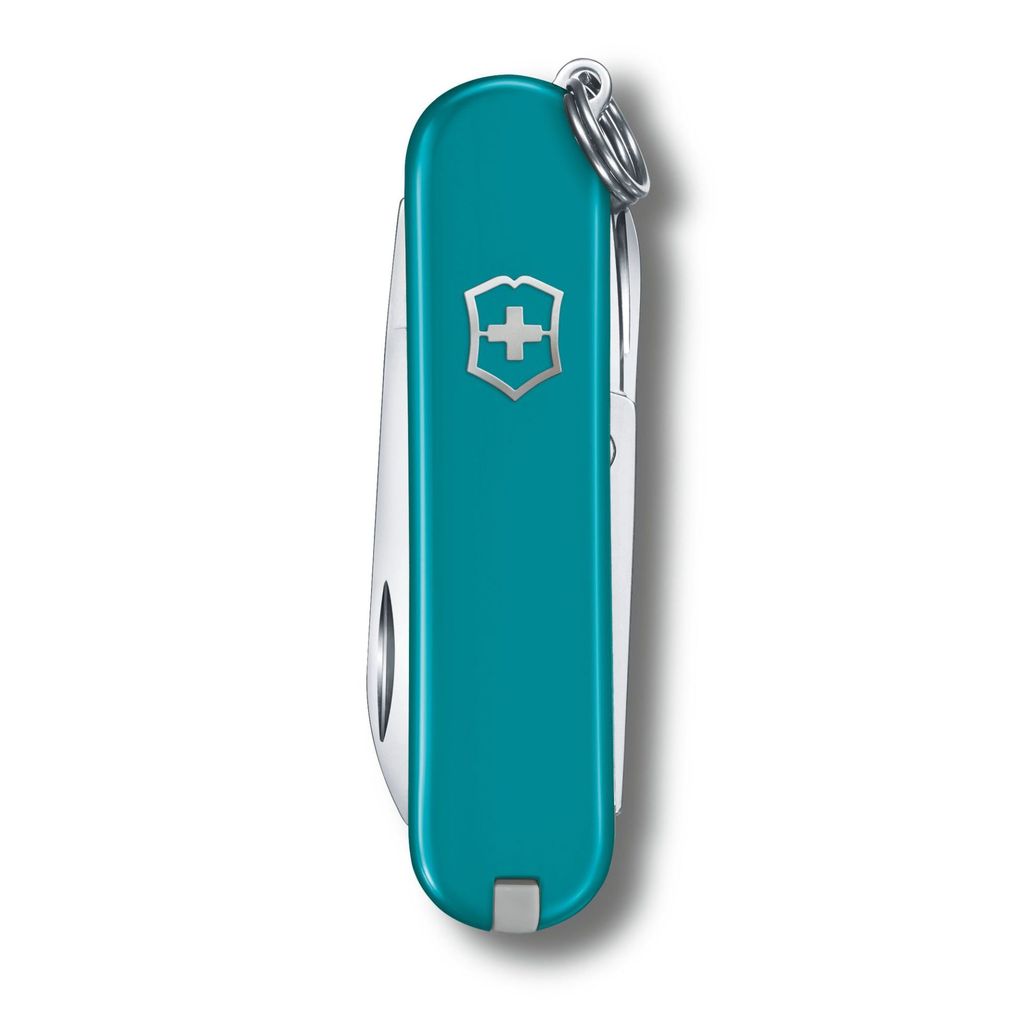 A side view of a turquoise Swiss Army knife with a silver cross logo and keyring.