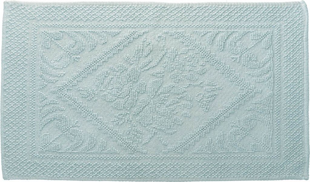 A light blue bath mat with a raised floral pattern.