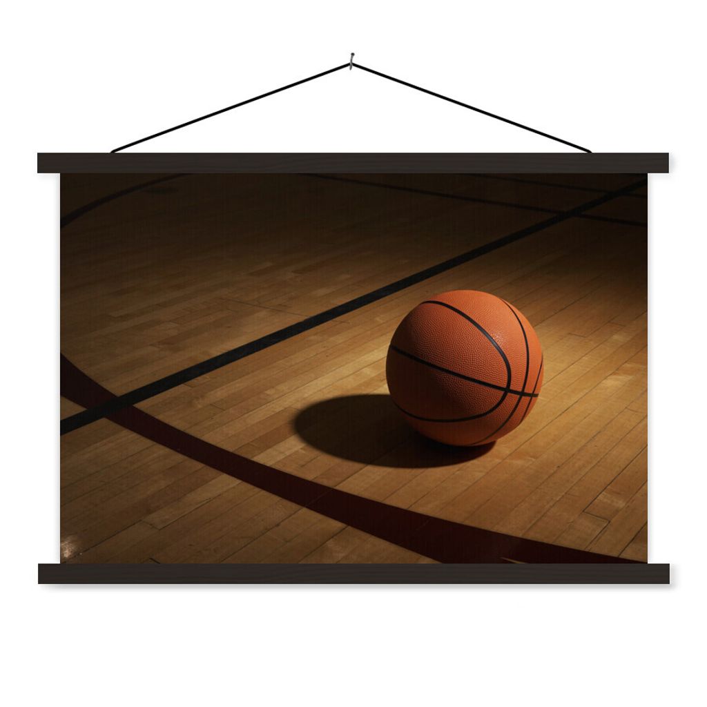 MuchoWow Textilposter Ein Basketball im Scheinwerferlicht auf einem Basketballplatz 150x100 cm mit schwarzem Rahmen - Schlafzimmer