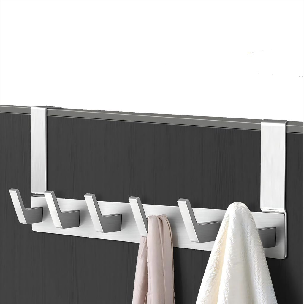 A metal over-the-door hook rack with six hooks, holding two folded garments and a towel.