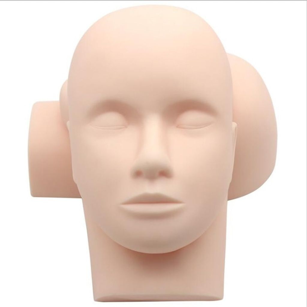 A mannequin head for eyelash extension training.