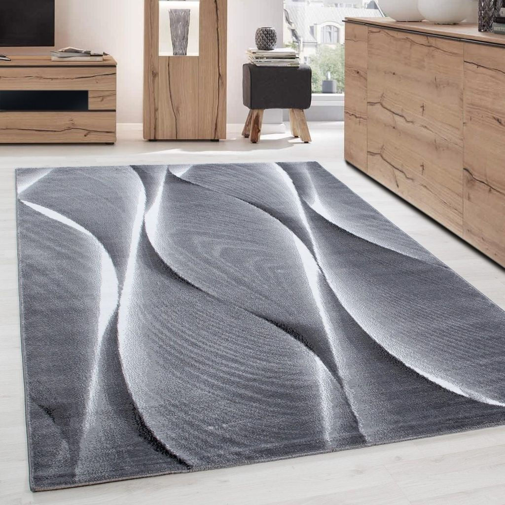 Moderner grauer Teppich mit organischem, wellenförmigem 3D-Effektmuster, ideal für Wohnzimmer, Schlafzimmer und Esszimmer. 200 x 290 cm