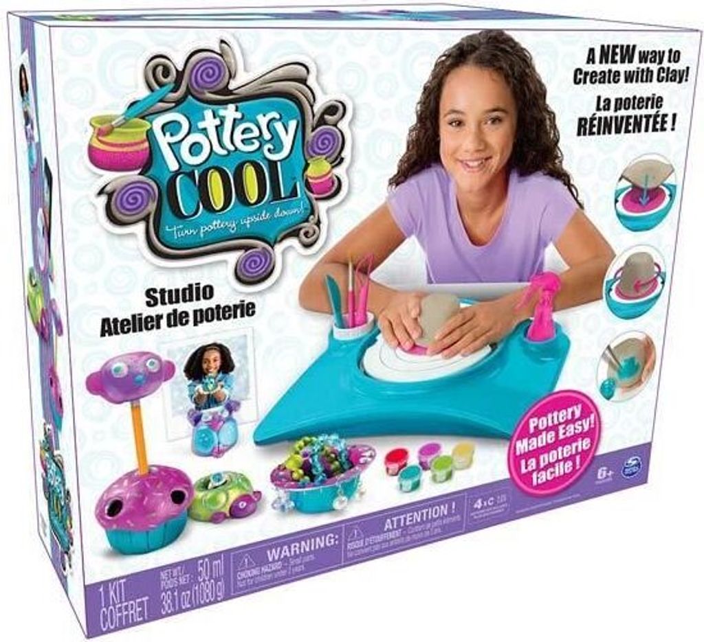 A product box for a children's pottery studio kit, featuring a young girl using the pottery wheel.