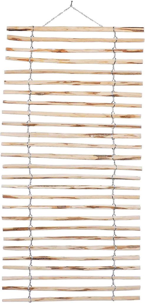 A wooden trellis for climbing plants, made of hazelnut branches, suspended by a wire.