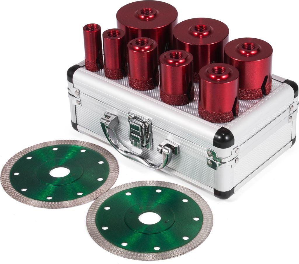 A set of diamond drill bits and diamond saw blades are displayed in a silver carrying case.