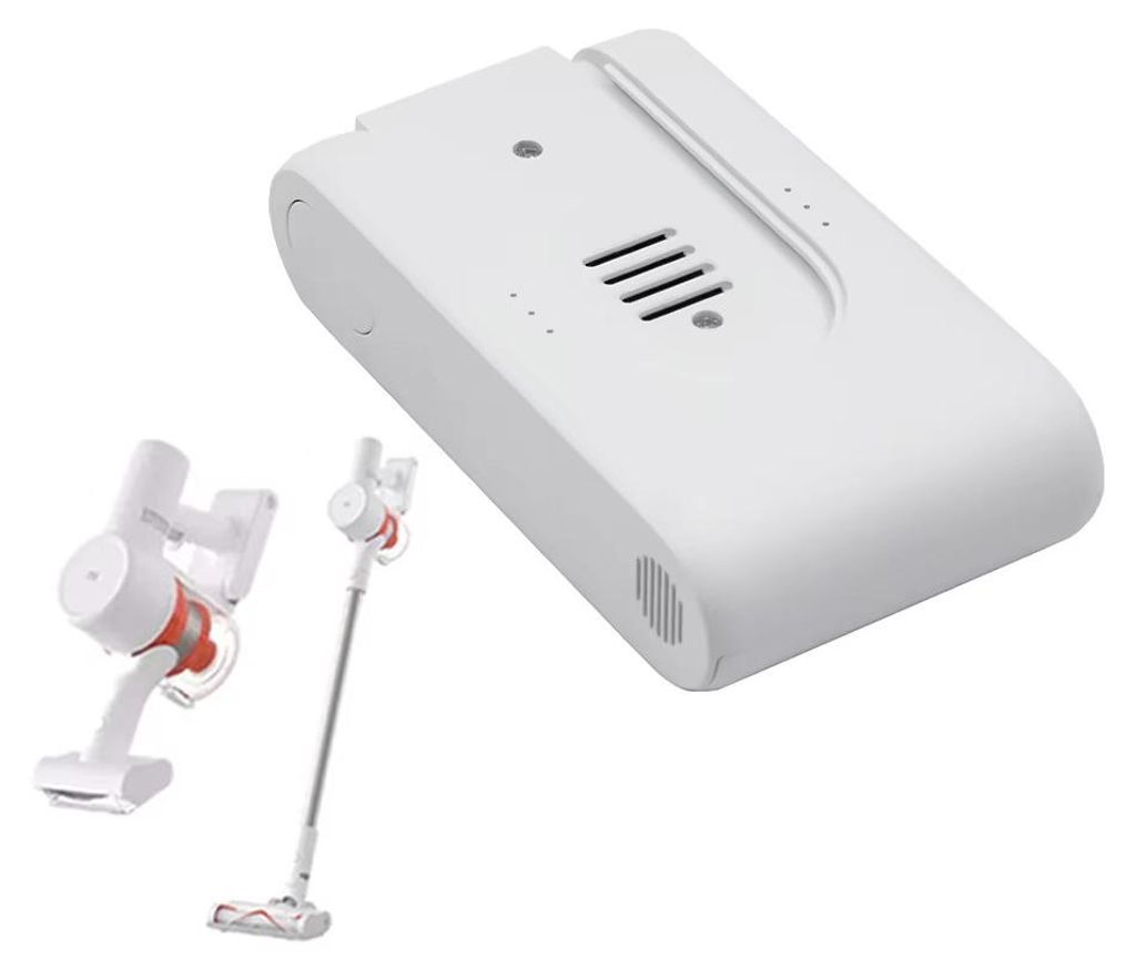 A white charging dock for a cordless vacuum cleaner is shown in the foreground, with two cordless vacuum cleaner attachments in the background.