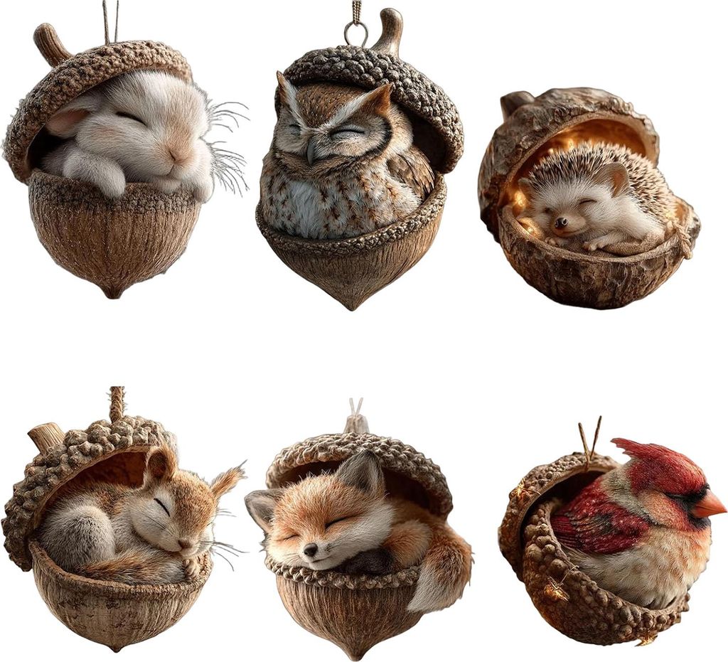 A collage of six different animal ornaments, each nestled inside a brown acorn shell. The animals include a rabbit, owl, hedgehog, squirrel, fox, and cardinal.